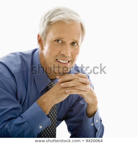Caucasian Man With Hands Folded In Front Smiling At Viewer Stock fotó © iofoto
