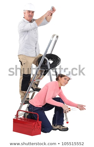 Stockfoto: Electrician And Young Female Helper
