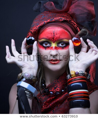 Zdjęcia stock: Portrait Of A Mysterious Woman With Artistic Make Up On Her Face