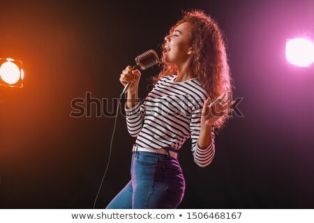 Сток-фото: Portrait Of Beautiful Female Singer Performing In Music Concert