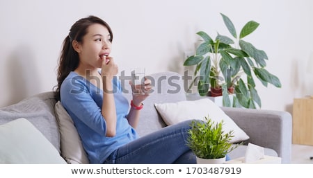 Foto stock: Eating Pills