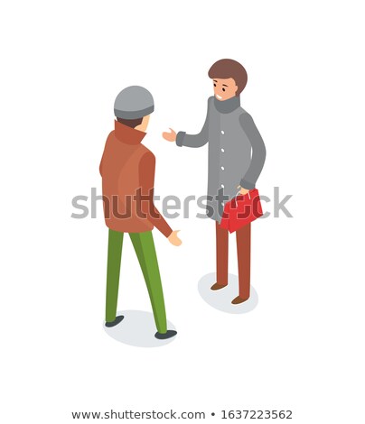 Stok fotoğraf: Male Friends Talking Outside Wearing Warm Clothes