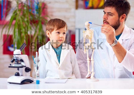 Stock foto: The Professor Studying Human Skeleton In Lab