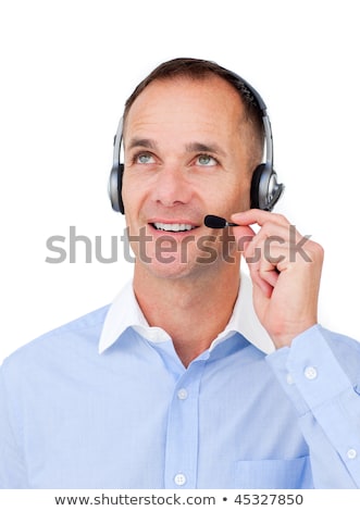 Foto stock: Male Call Center Agent Looking Upwards Against A White Background