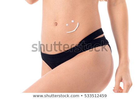 Stock photo: Pretty Young Woman Tanning Her Skin In A Modern Sunbed