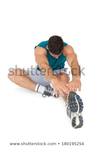 Foto stock: Sports Man Doing Physical Exercise For Stretching Over White Background