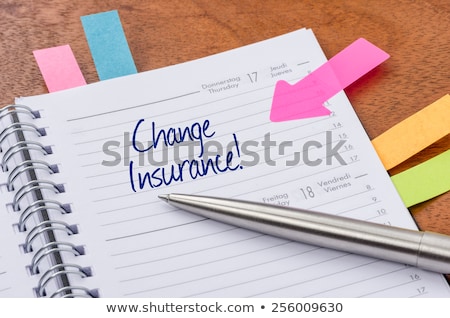 Stockfoto: Daily Planner With The Entry Change Insurance