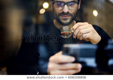 Stock photo: Close Up Of A Man Looking At Magazine