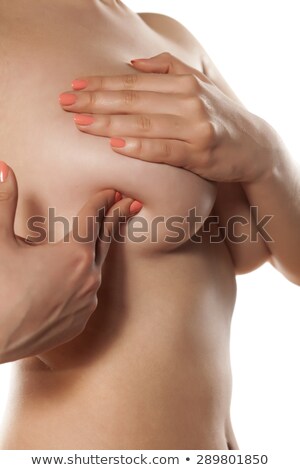 Foto stock: Shirtless Young Woman Examining Breast