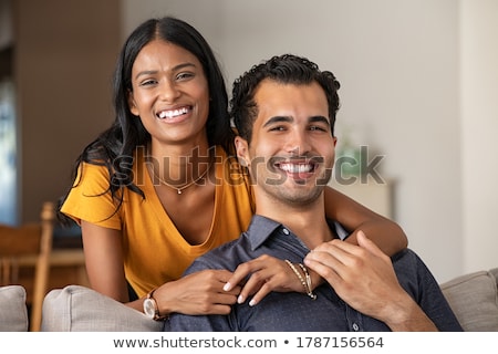 Stok fotoğraf: Positive Young Multiethnic Couple