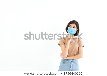 [[stock_photo]]: Portrait Of A Confused Young Girl Presenting Copy Space