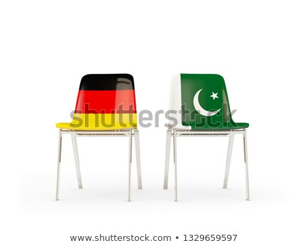 Stok fotoğraf: Two Chairs With Flags Of Germany And Pakistan