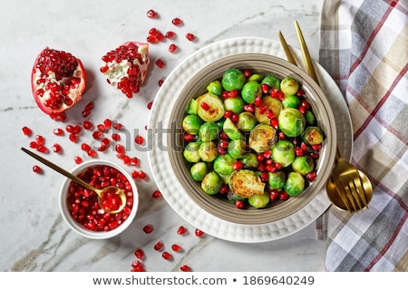 Сток-фото: Close Up Of Pomegranate On Stone Table