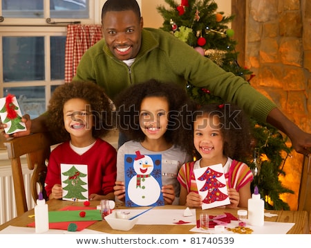 Stok fotoğraf: African American Father Making Christmas Cards With Children