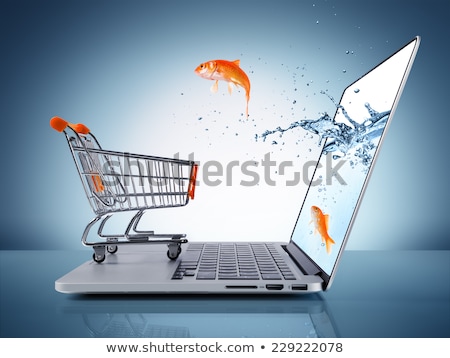 Foto stock: Goldfish Jump Out Of The Monitor