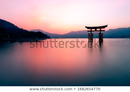 Stok fotoğraf: Serene View Of Calm Lake At Twilight