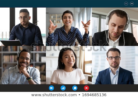 Stock photo: Group Of People Looking At Laptop
