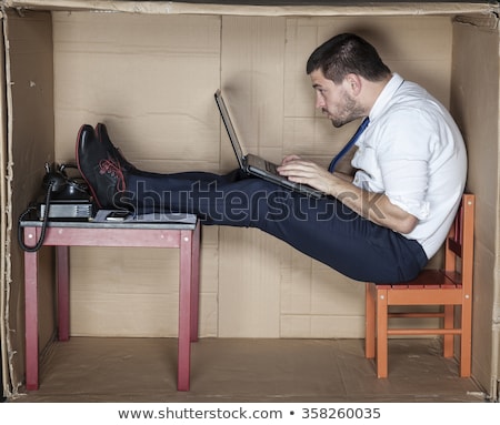 Stockfoto: Employee Working In Tight Space