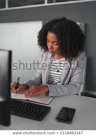 Stock photo: Woman Writing In Her Diary