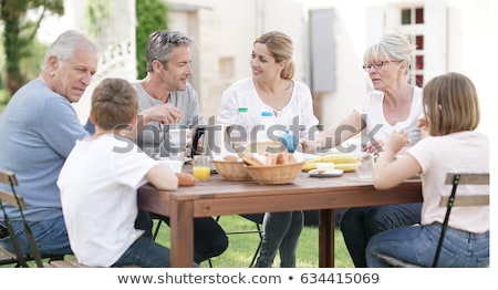 Сток-фото: Family Having Breakfast Outdoors
