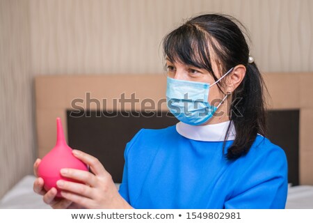 Сток-фото: Nurse Prepares An Enema