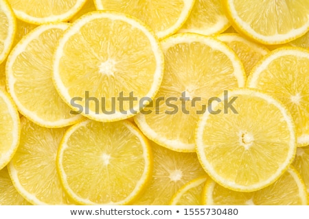 Foto stock: Abstract Background With Citrus Fruit Of Lemon Slices Close Up