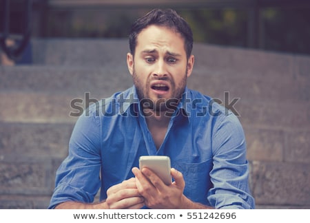 Foto stock: Shocked And Disgusted Man On Phone