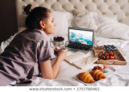 Foto stock: Woman Lying On Bed