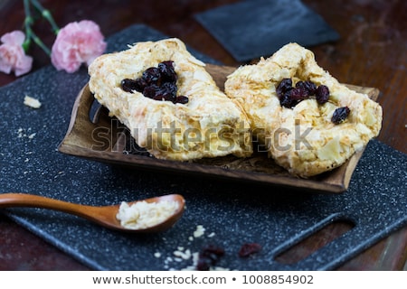 Stock fotó: Chocolate Puffs With Almonds And Dried Cranberries