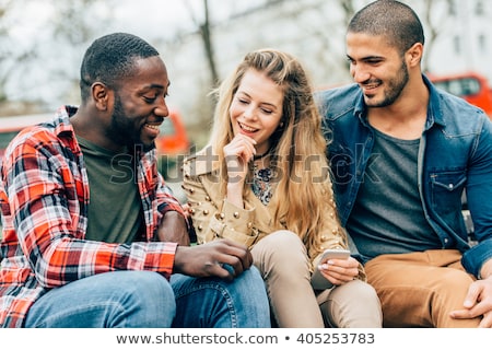 Stock photo: Two Beautiful Girls In Men Shirts And Jeans