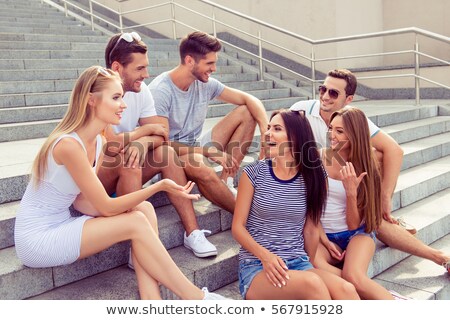 Stock fotó: Friends Sitting Outside