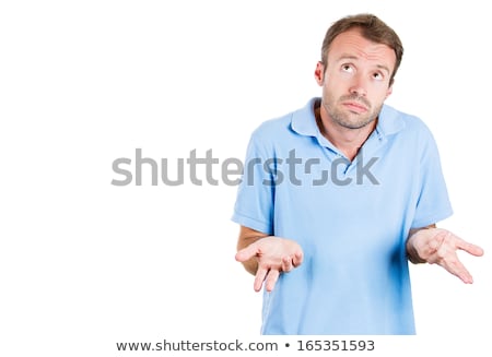 Stok fotoğraf: Portrait Of A Frustrated Confused Man In A White Shirt