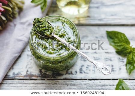 [[stock_photo]]: Bruschetta With Pesto Sauce Parmesan Cheese And Fresh Basil