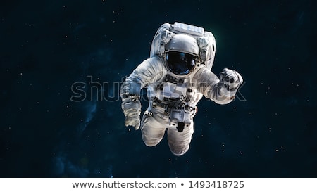 [[stock_photo]]: Astronaut Flying In The Deep Galaxy