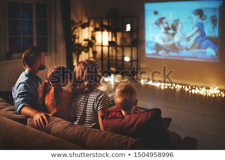 Stock foto: Family Watching Television At Home