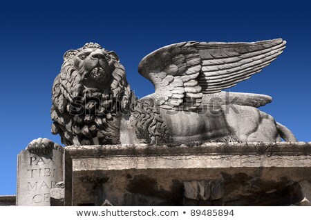 Stockfoto: Sculpture Depicting Image Of Lion With Wings Symbol Of Venice