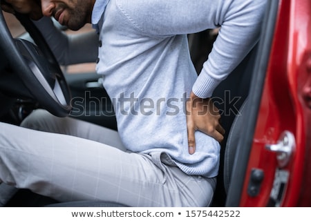 Foto stock: Driver Having Backpain After Driving Car