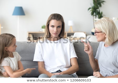 Stockfoto: Disagreement Between Senior Mother Adult Daughter