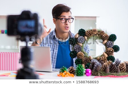 Stock photo: Young Vlogger Recording Video Doing Christmas Decoration