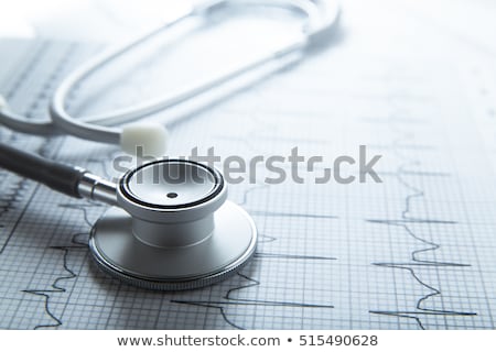 Stok fotoğraf: Medical Stethoscope On An Ekg Chart