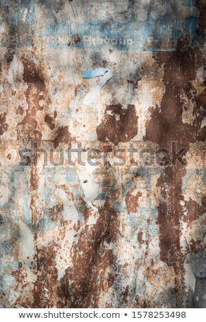 Stock photo: Old Blue Painted Wall With Ragged Scraps Ads
