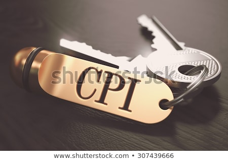 Foto stock: Cpi - Bunch Of Keys With Text On Golden Keychain