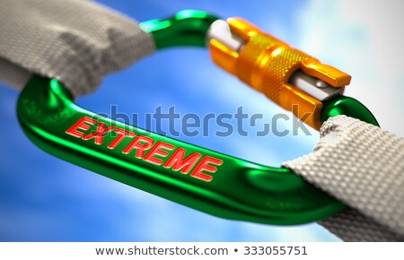 ストックフォト: Extreme On Green Carabiner Between White Ropes