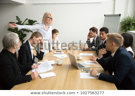 Foto stock: Meeting Office Angry Boss Managers At Table Business Concept