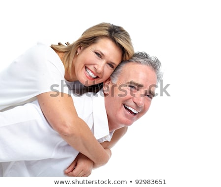 商業照片: Happy Couple Hugging Over White Background