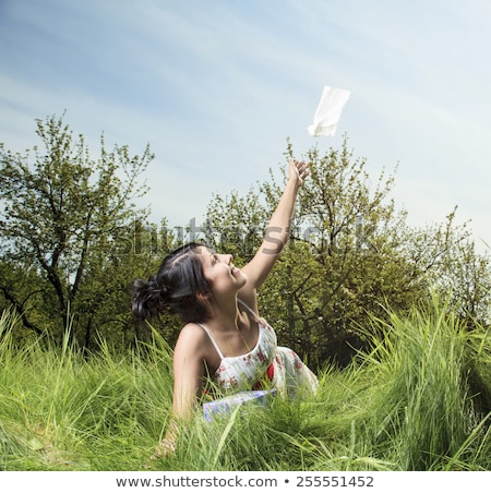 Stock photo: Woman Sending Handkerchief On The Air