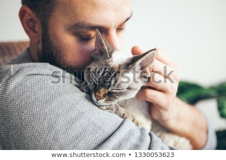 Stock photo: Man Holding Cat