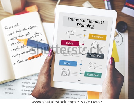 [[stock_photo]]: Financial Plan Word On Notepad