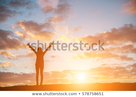 Stockfoto: Traveler Standing With Raised Arms Up