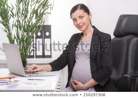 Сток-фото: Happy Pregnant Business Woman Holding Laptop Computer